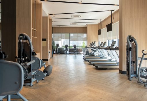 Modern fitness center with gym equipment decoration. interior design background